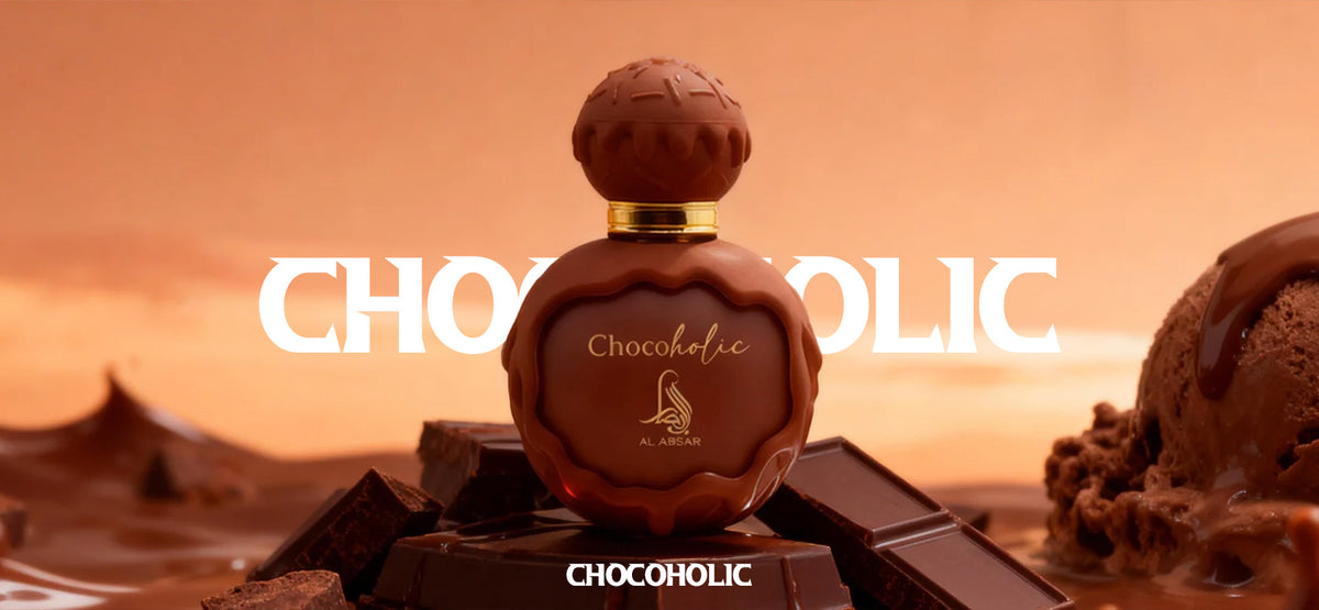 Chocolatic perfume bottle shaped like a chocolate truffle, surrounded by chocolate pieces. -Al Absar